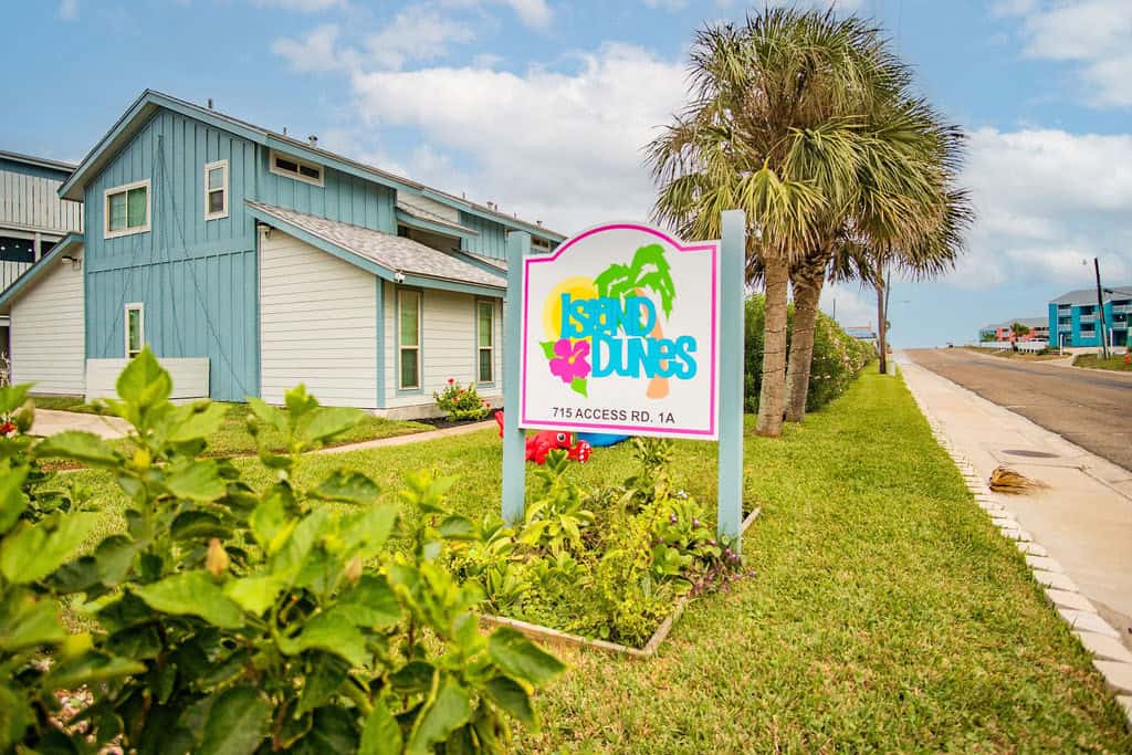 The Island Dunes property sign